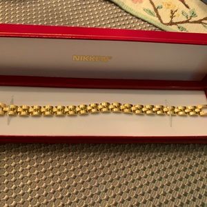 Nikken bracelet. Plated in 24k gold. Brand New